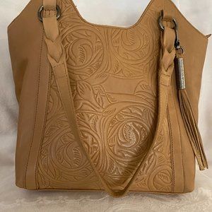 The Sak cream colored shoulder bag